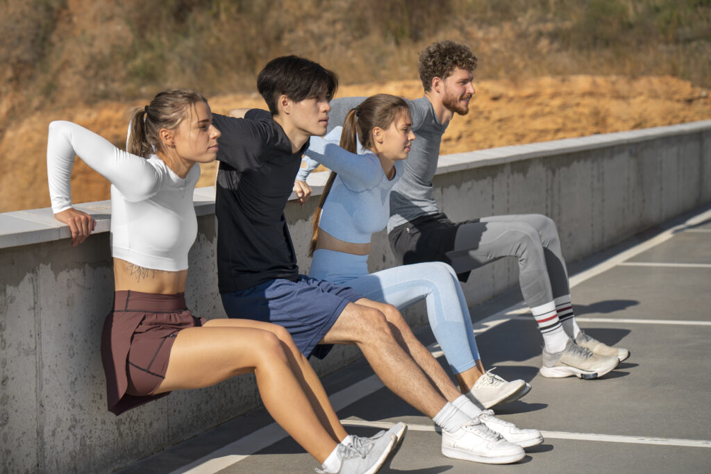 group people working out together outdoors
