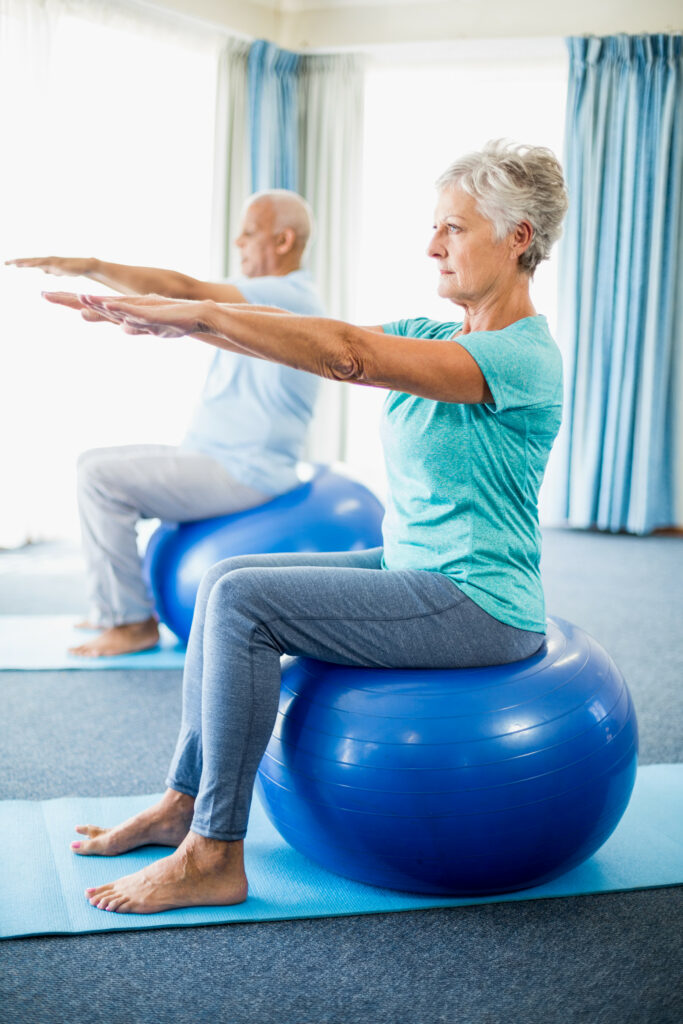 seniors using exercise ball
